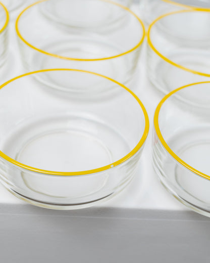 Set of 9 Empoli glass bowls 1980s clear glass with yellow rim Fratelli Buggiani Vintage