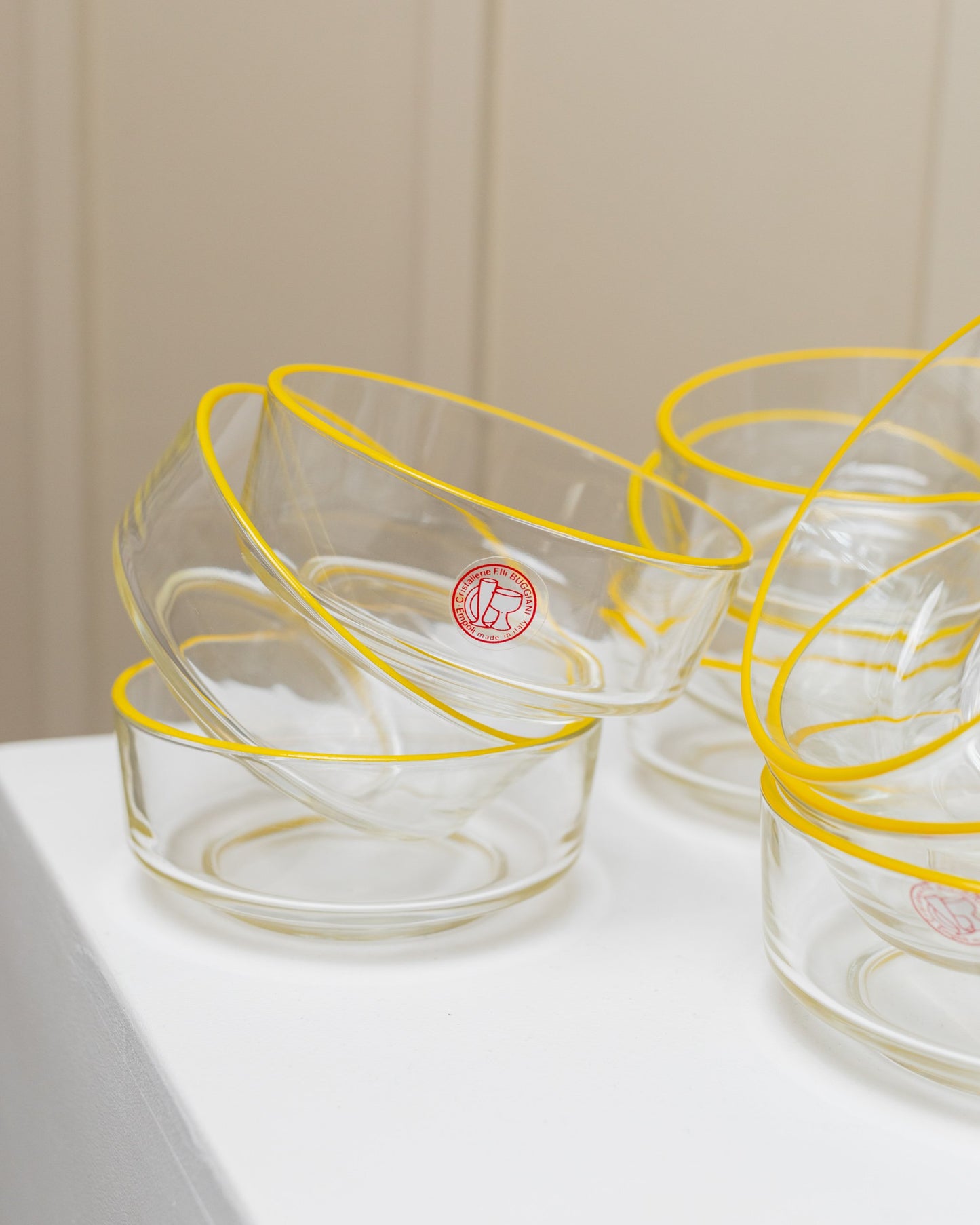 Set of 9 Empoli glass bowls 1980s clear glass with yellow rim Fratelli Buggiani Vintage