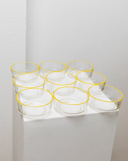 Set of 9 Empoli glass bowls 1980s clear glass with yellow rim Fratelli Buggiani Vintage