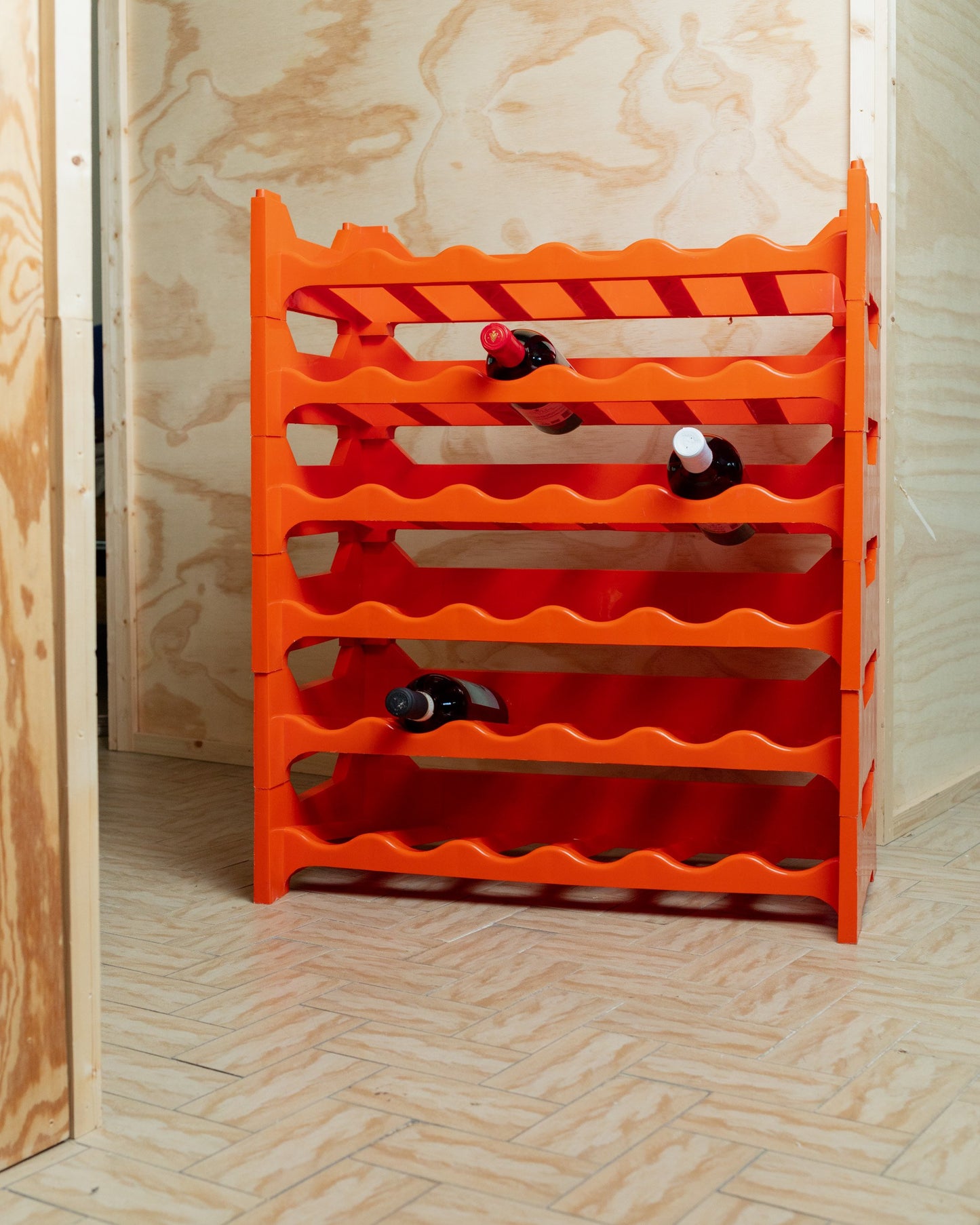 3 modules of a mid-century wine rack in orange-red, from Italy 70s modular and expandable, storage bottles vintage