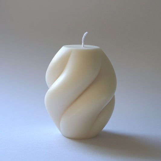 Handmade designer candle curved