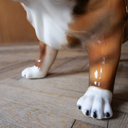 Brown and white ceramic bulldog sculpture