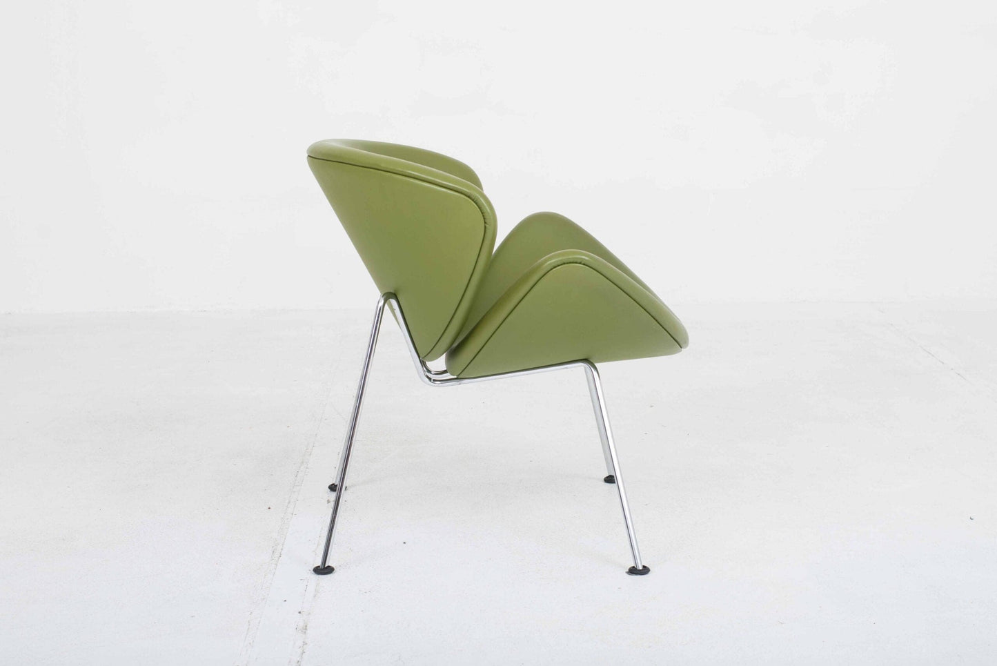 Artifort Orange Slice armchair by Pierre Paulin in green leather