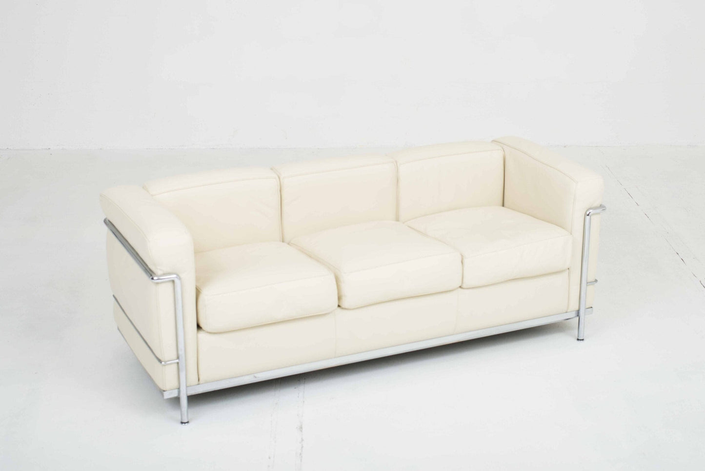 Cassina LC2 3 seater sofa by Le Corbusier in vintage cream leather