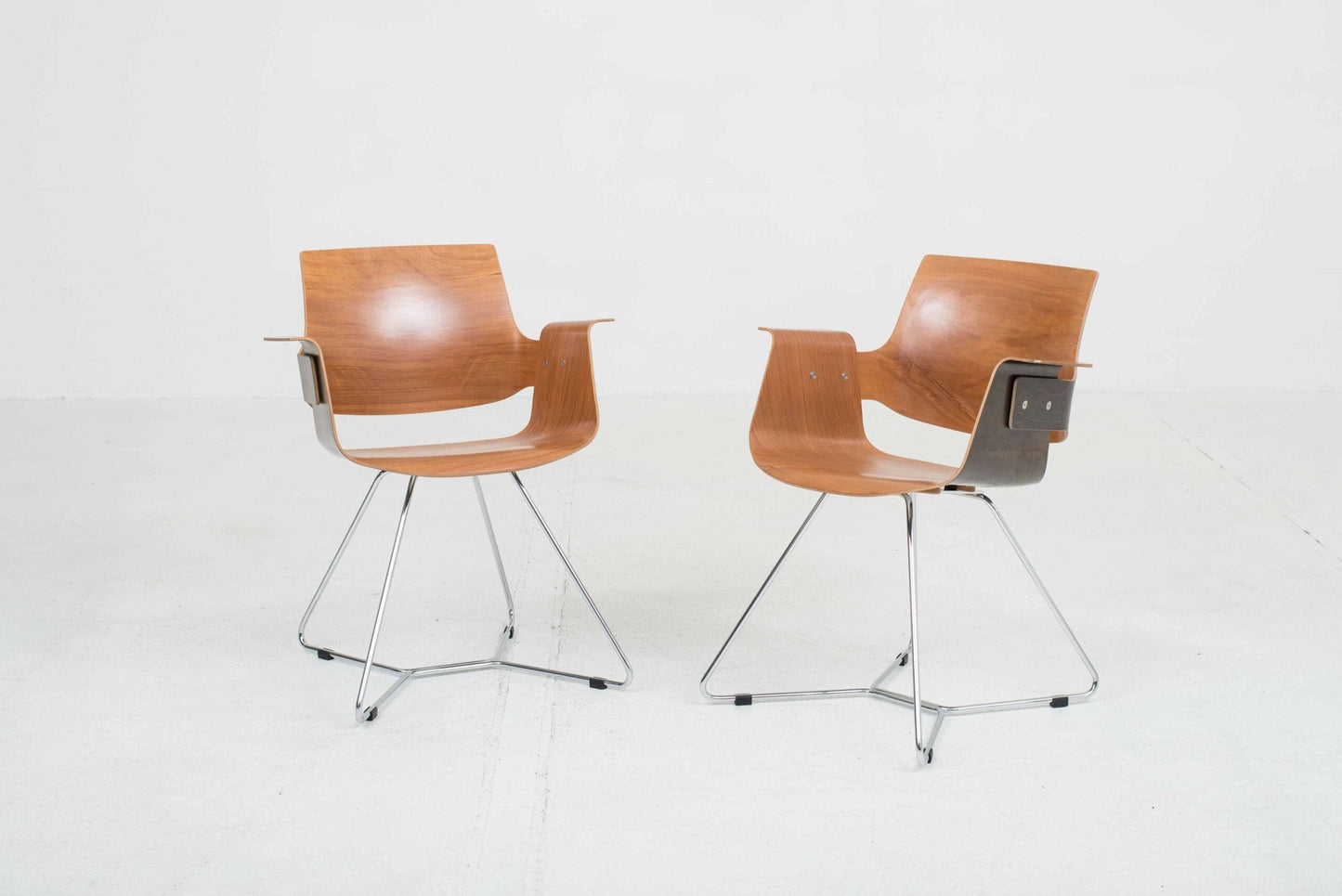 Embru Atelier chair by Christophe Marchand with cross base in brown vintage