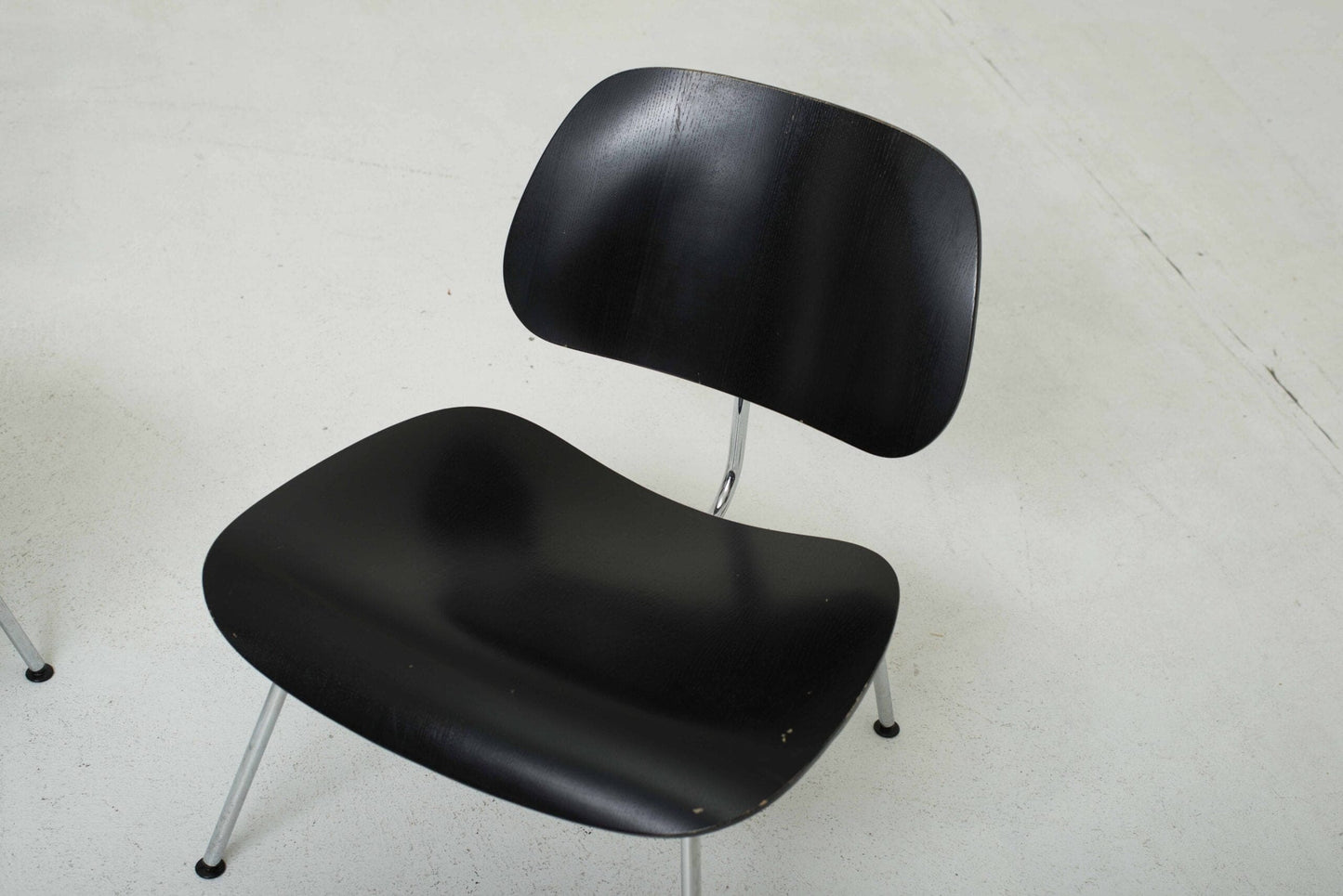 Fauteuil Vitra LCM de Charles et Ray Eames en noir vintage