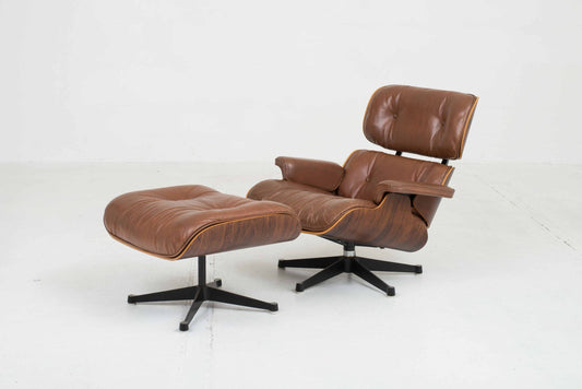 Vitra 670 Lounge Chair and Ottoman by Charles and Ray Eames, classic dimensions and rosewood vintage