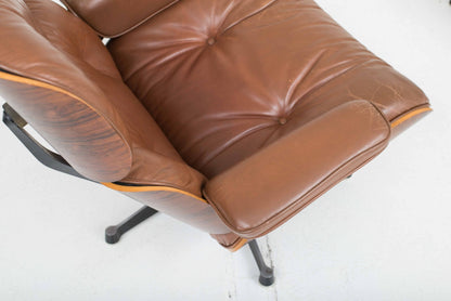 Vitra 670 Lounge Chair et Ottoman de Charles et Ray Eames, classique en masse et palissandre vintage