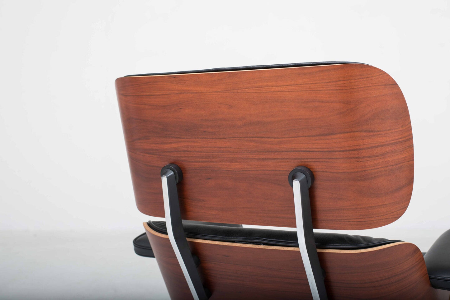 Vitra 670 Lounge Chair and Ottoman by Charles and Ray Eames, classic dimensions and rosewood