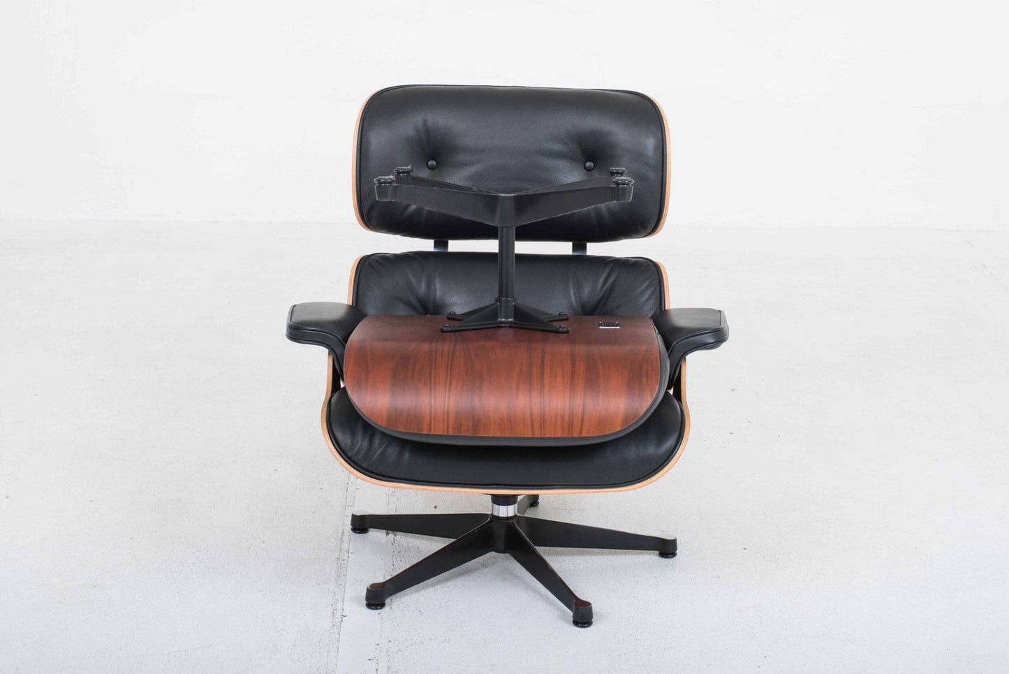 Vitra 670 Lounge Chair and Ottoman by Charles and Ray Eames, classic dimensions and rosewood