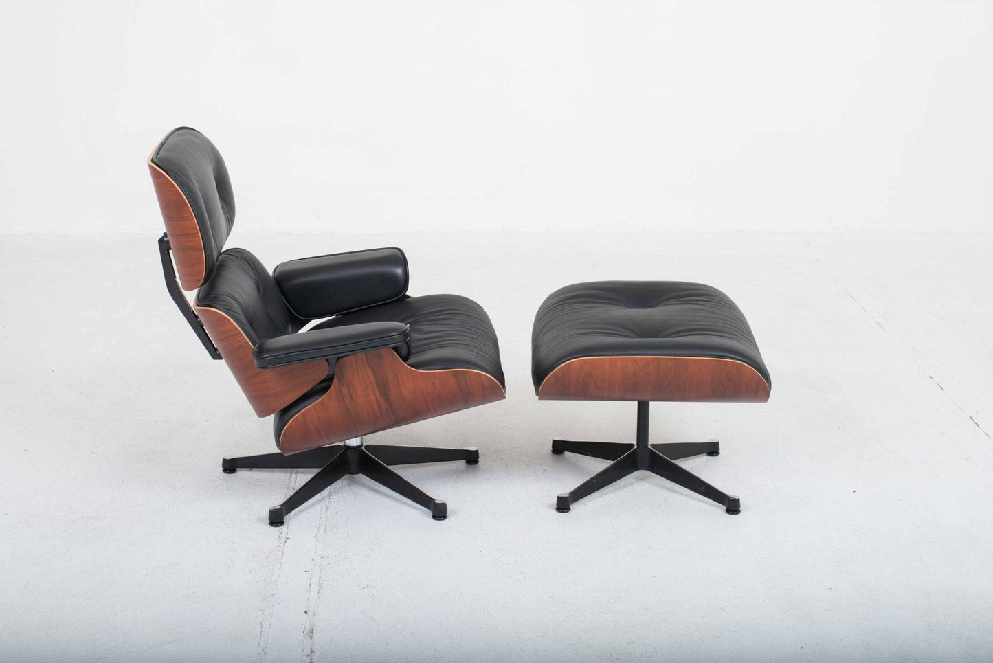 Vitra 670 Lounge Chair and Ottoman by Charles and Ray Eames, classic dimensions and rosewood