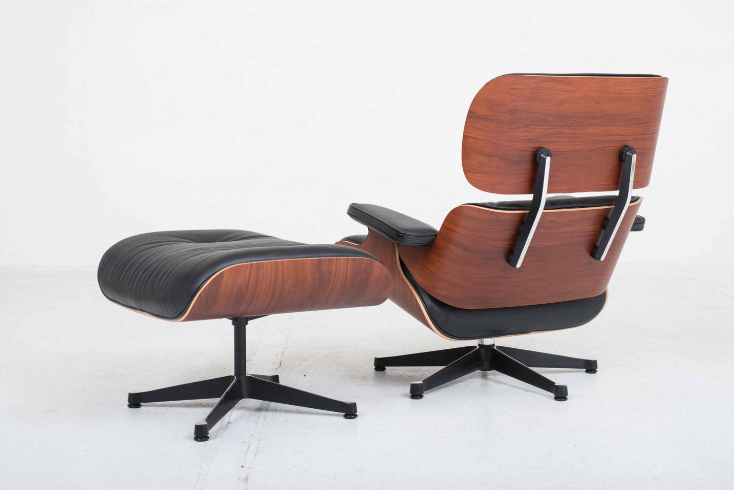 Vitra 670 Lounge Chair and Ottoman by Charles and Ray Eames, classic dimensions and rosewood