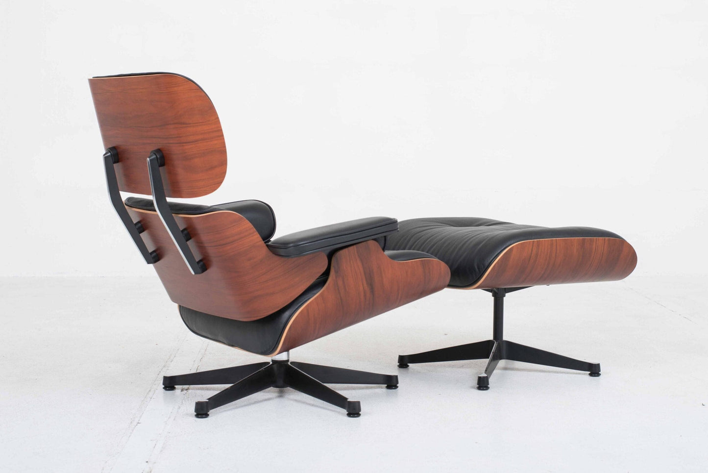 Vitra 670 Lounge Chair and Ottoman by Charles and Ray Eames, classic dimensions and rosewood