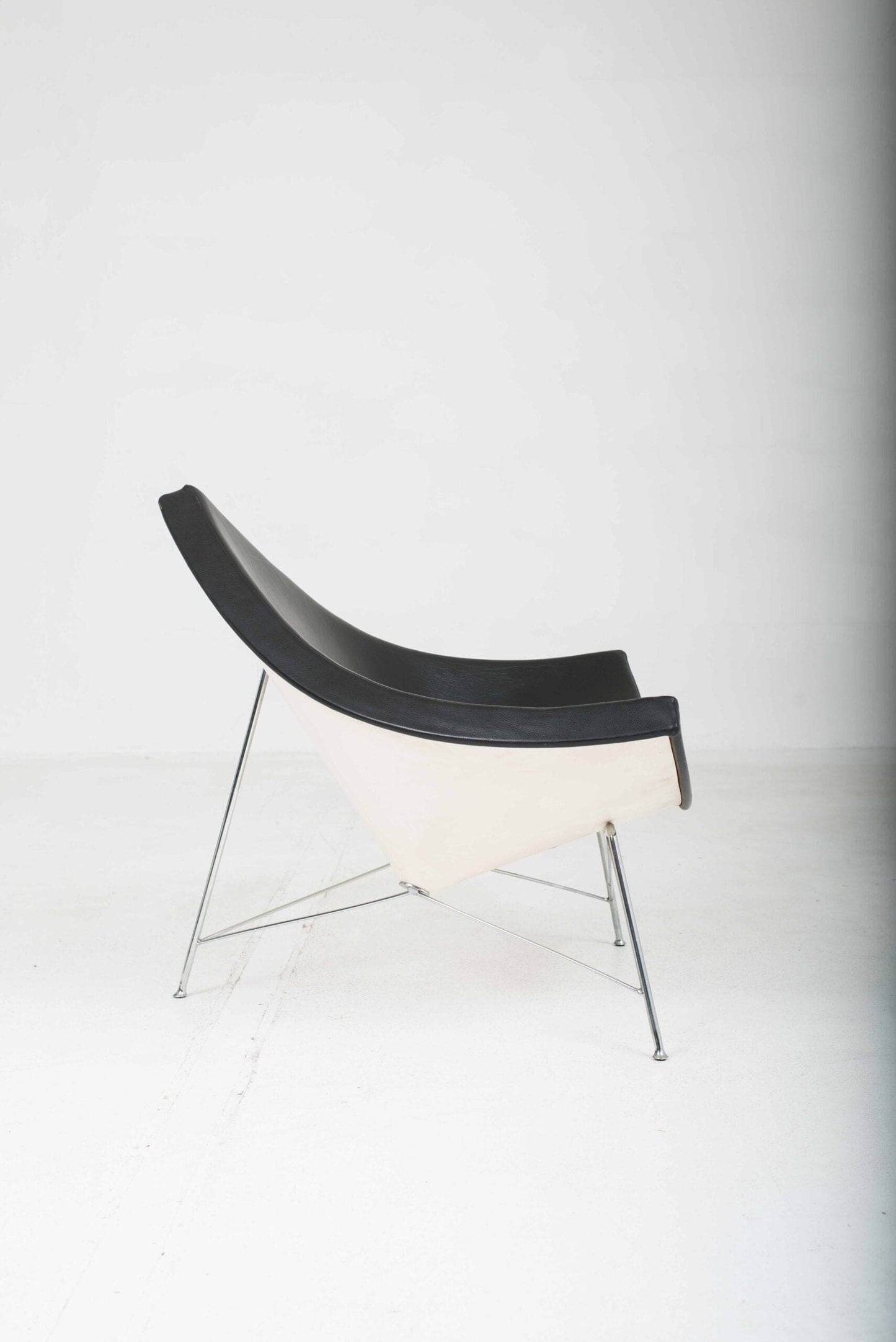 Vitra Coconut armchair by George Nelson in black leather Vintage