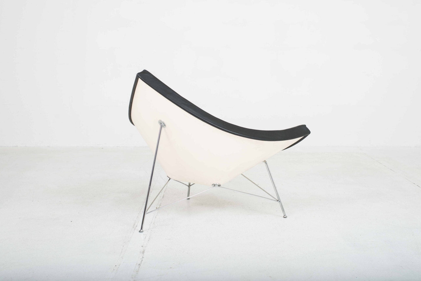 Vitra Coconut armchair by George Nelson in black leather Vintage