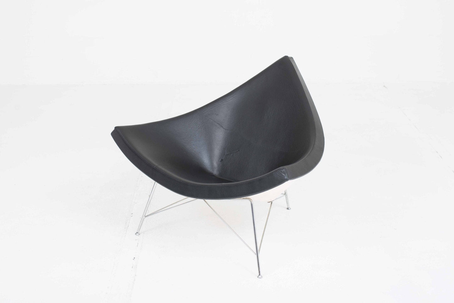 Vitra Coconut armchair by George Nelson in black leather Vintage