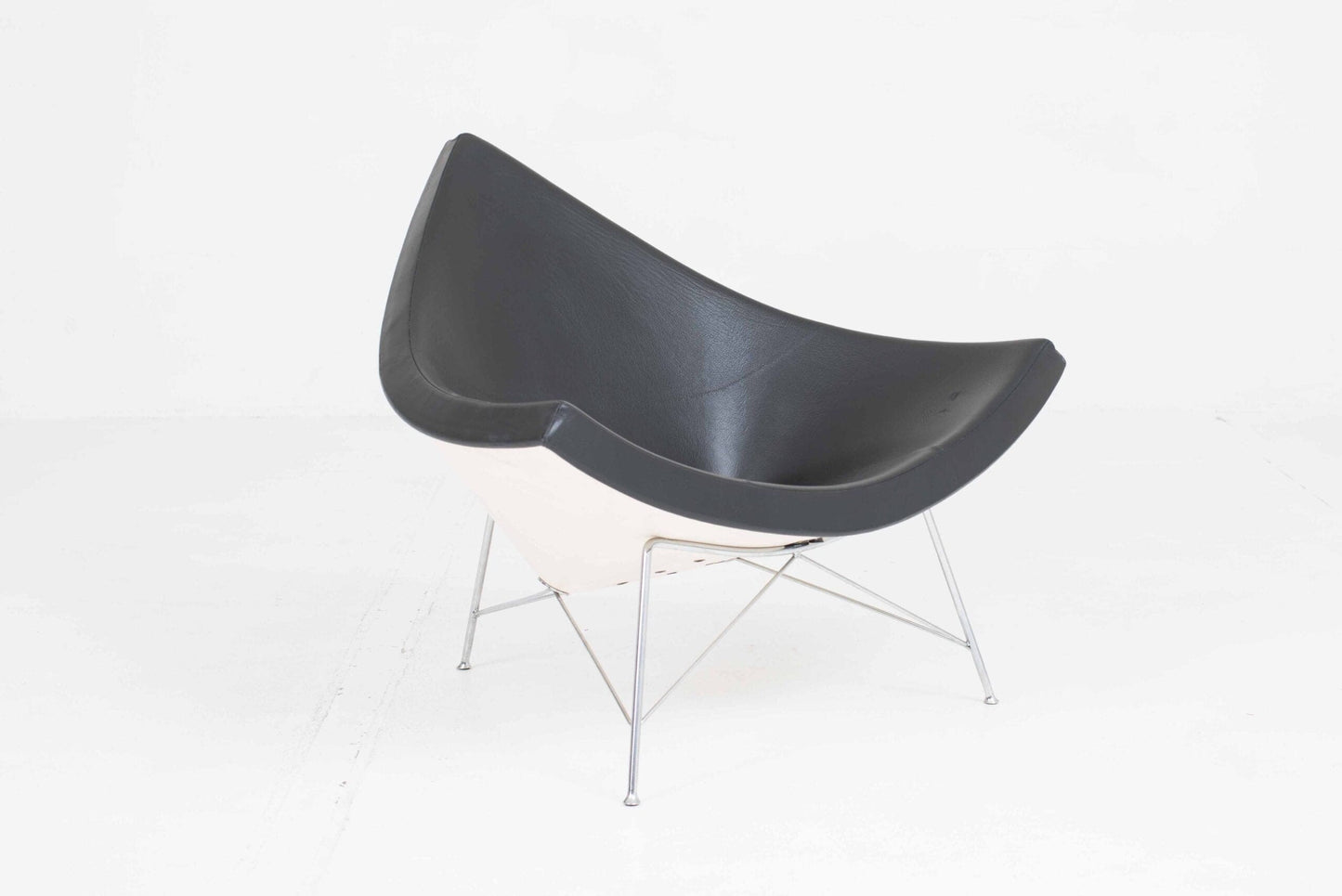 Vitra Coconut armchair by George Nelson in black leather Vintage