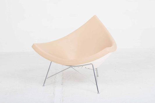 Vitra Coconut armchair by George Nelson in cream leather