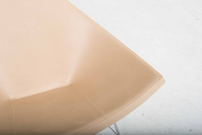 Vitra Coconut armchair by George Nelson in cream leather