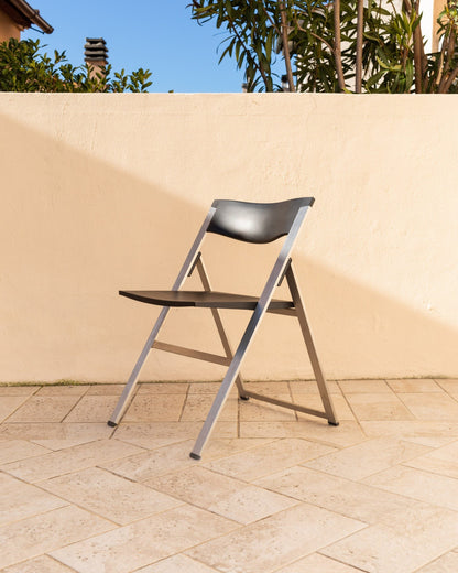 Tecno folding chair P08 design Justus Kolberg steel and black plastic Made in Italy 1990s Vintage