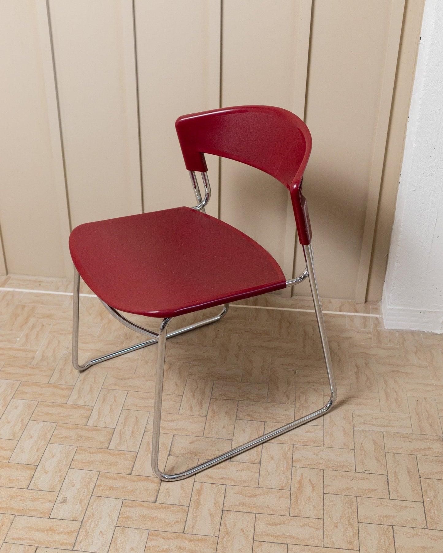 Stacking chair by Paolo Favaretto for Assisa Italy 1986 Chrome and plastic in red design classic vintage