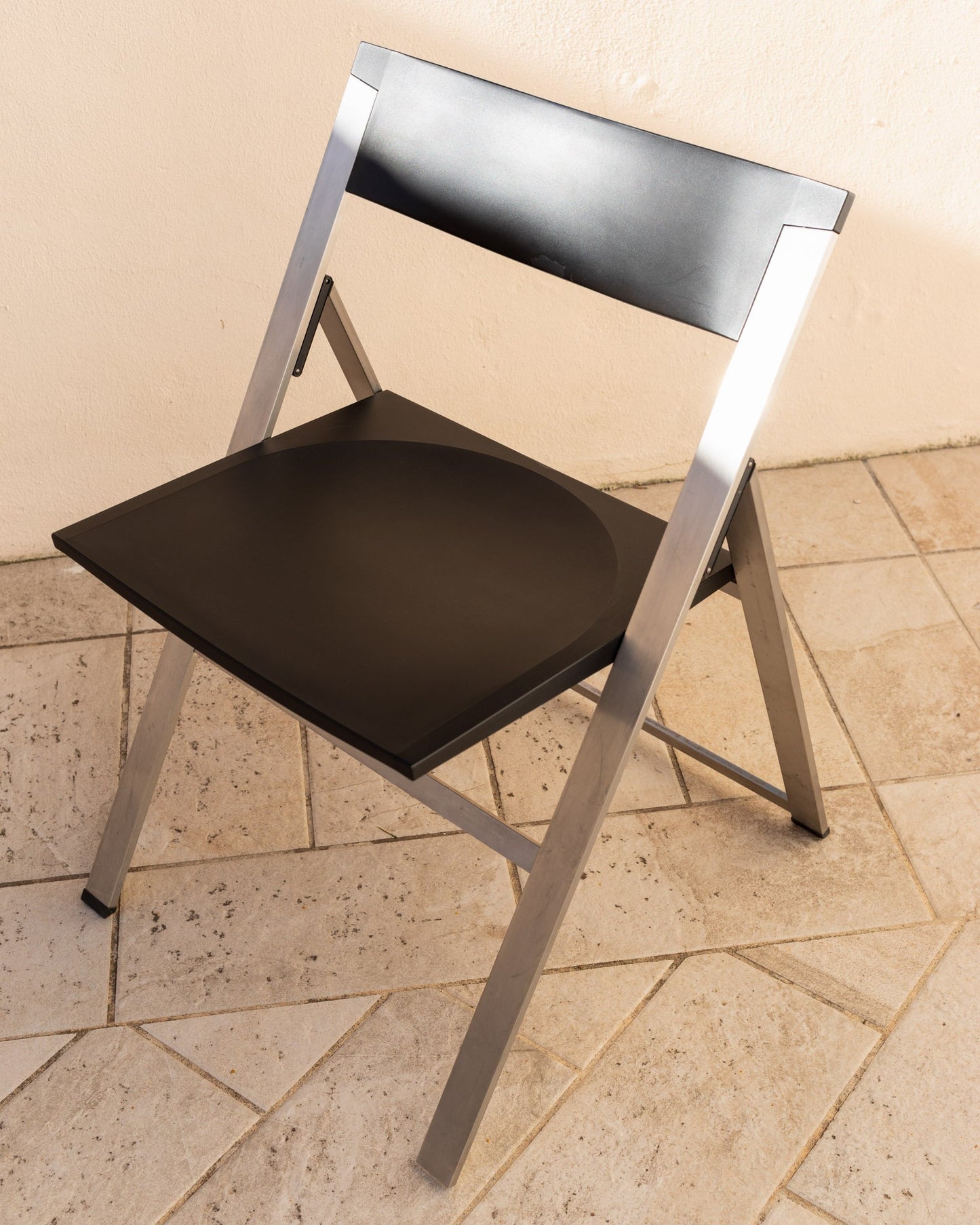 Tecno folding chair P08 design Justus Kolberg steel and black plastic Made in Italy 1990s Vintage