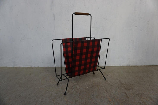 Nostalgic newspaper rack from the Mid Century period Vintage