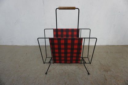 Nostalgic newspaper rack from the Mid Century period Vintage