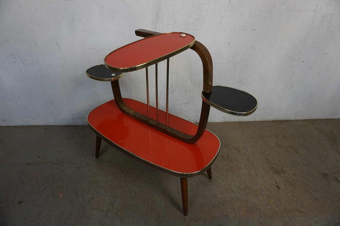 Decorative flower stand with black and red formica shelves Vintage