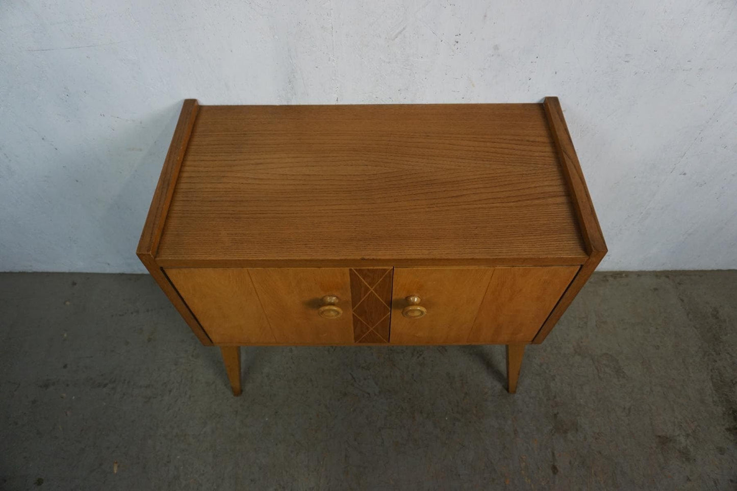 Stylish mid-century cabinet in light wood vintage