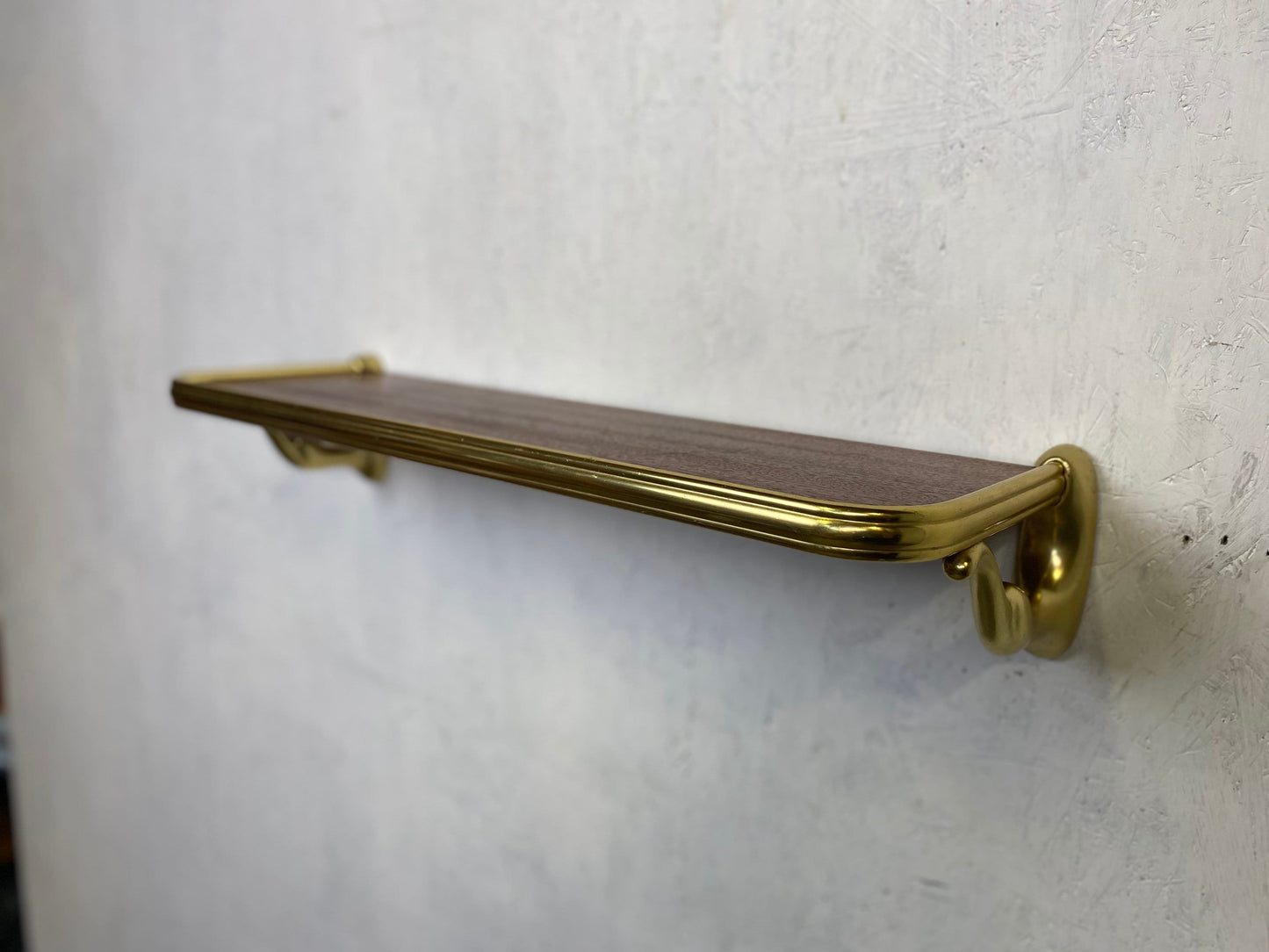 Elegant mid-century wall shelf in brass and teak vintage