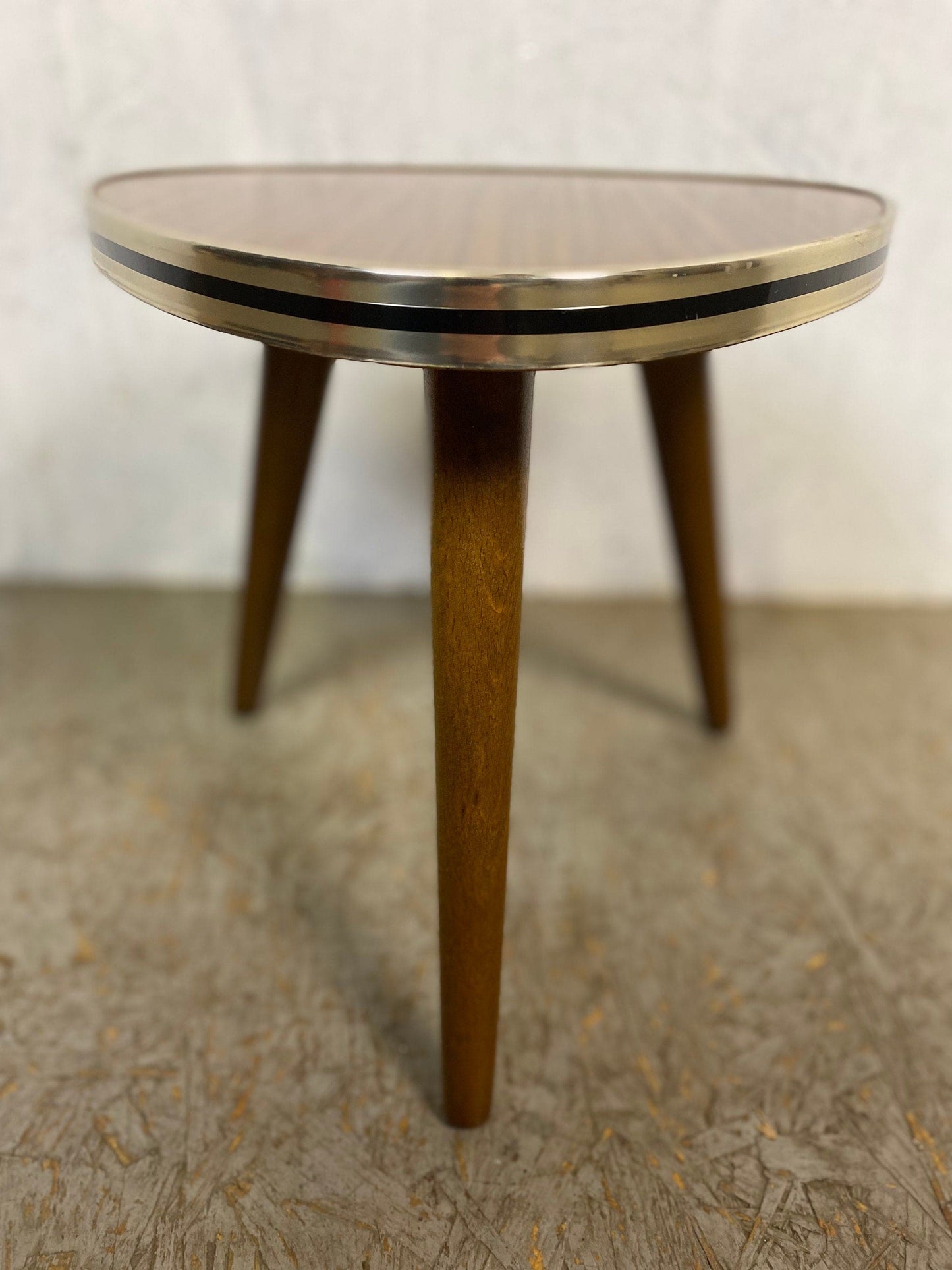 Great tripod flower stool with formica top in vintage wood decor