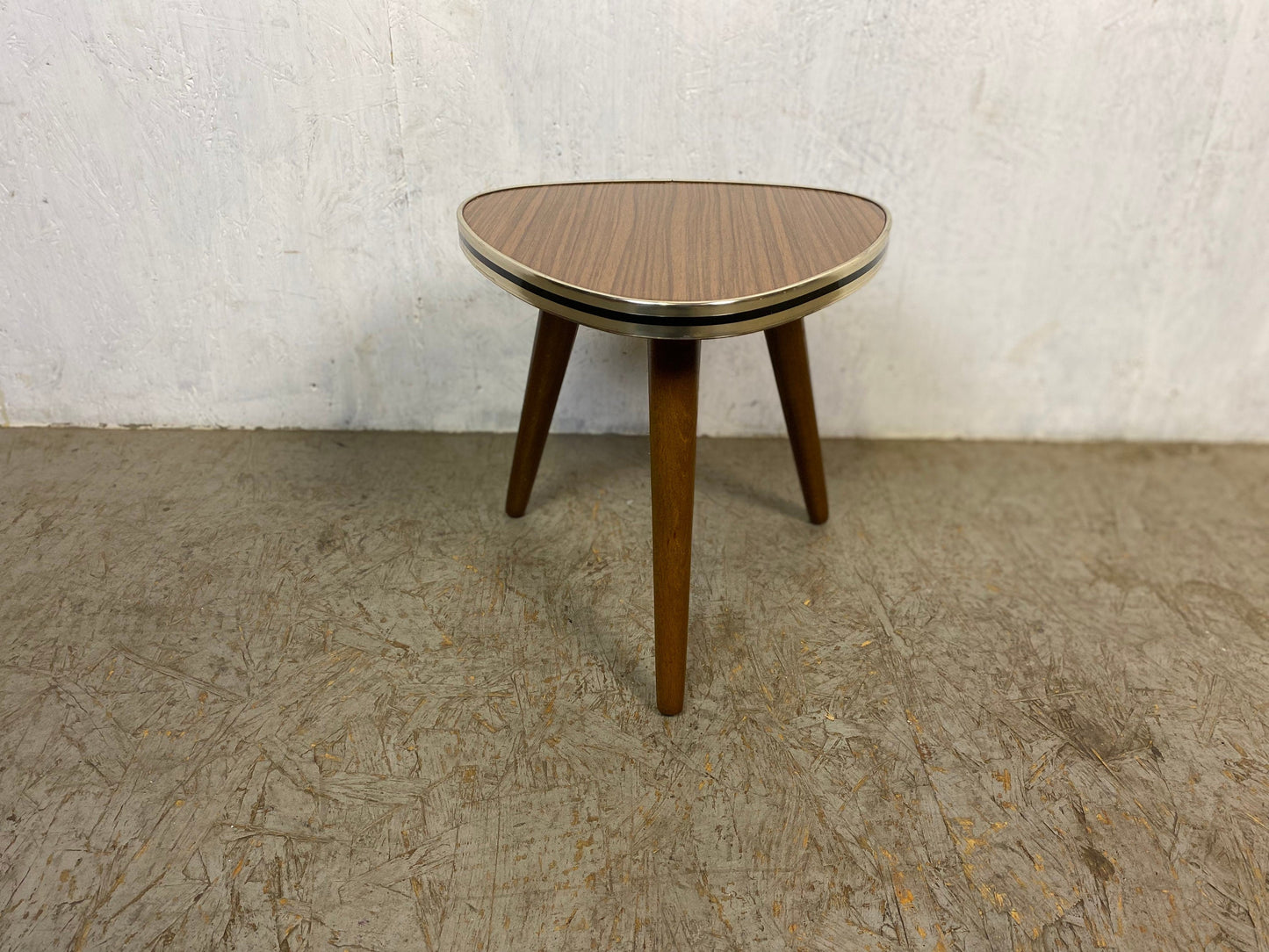 Great tripod flower stool with formica top in vintage wood decor