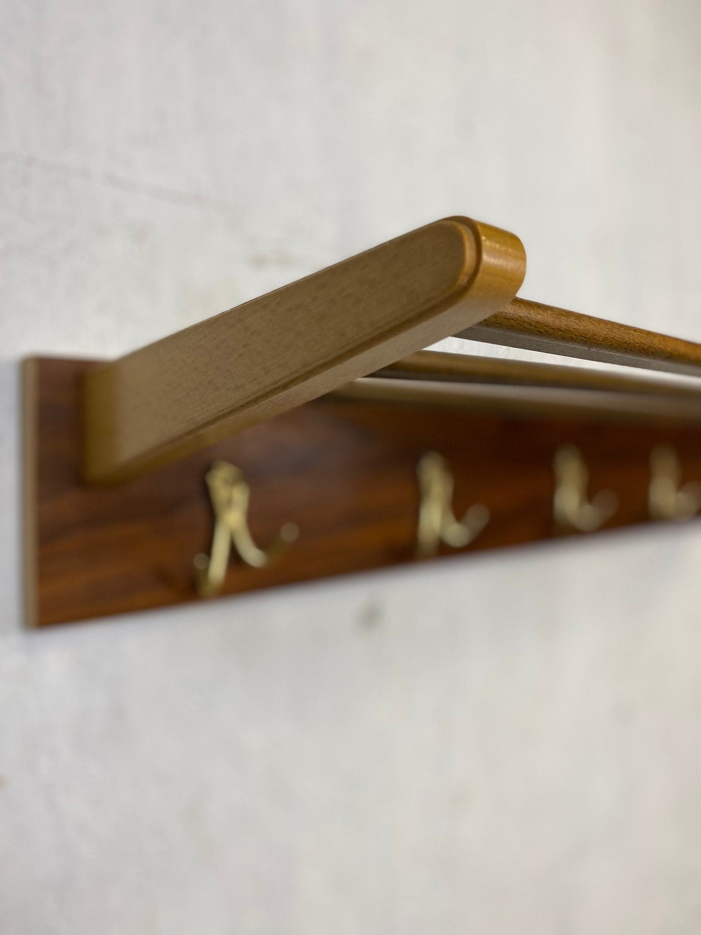 Beautiful coat rack in walnut with brass hooks Vintage