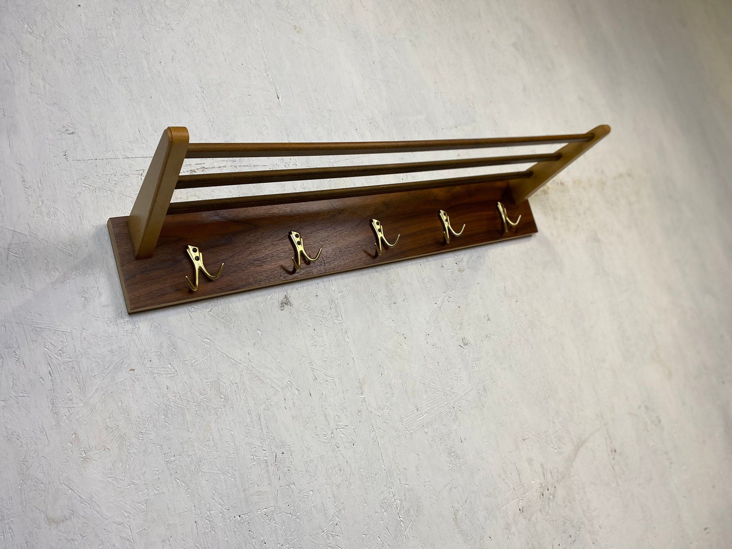 Beautiful coat rack in walnut with brass hooks Vintage