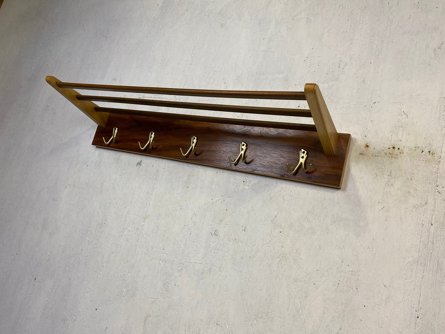 Beautiful coat rack in walnut with brass hooks Vintage