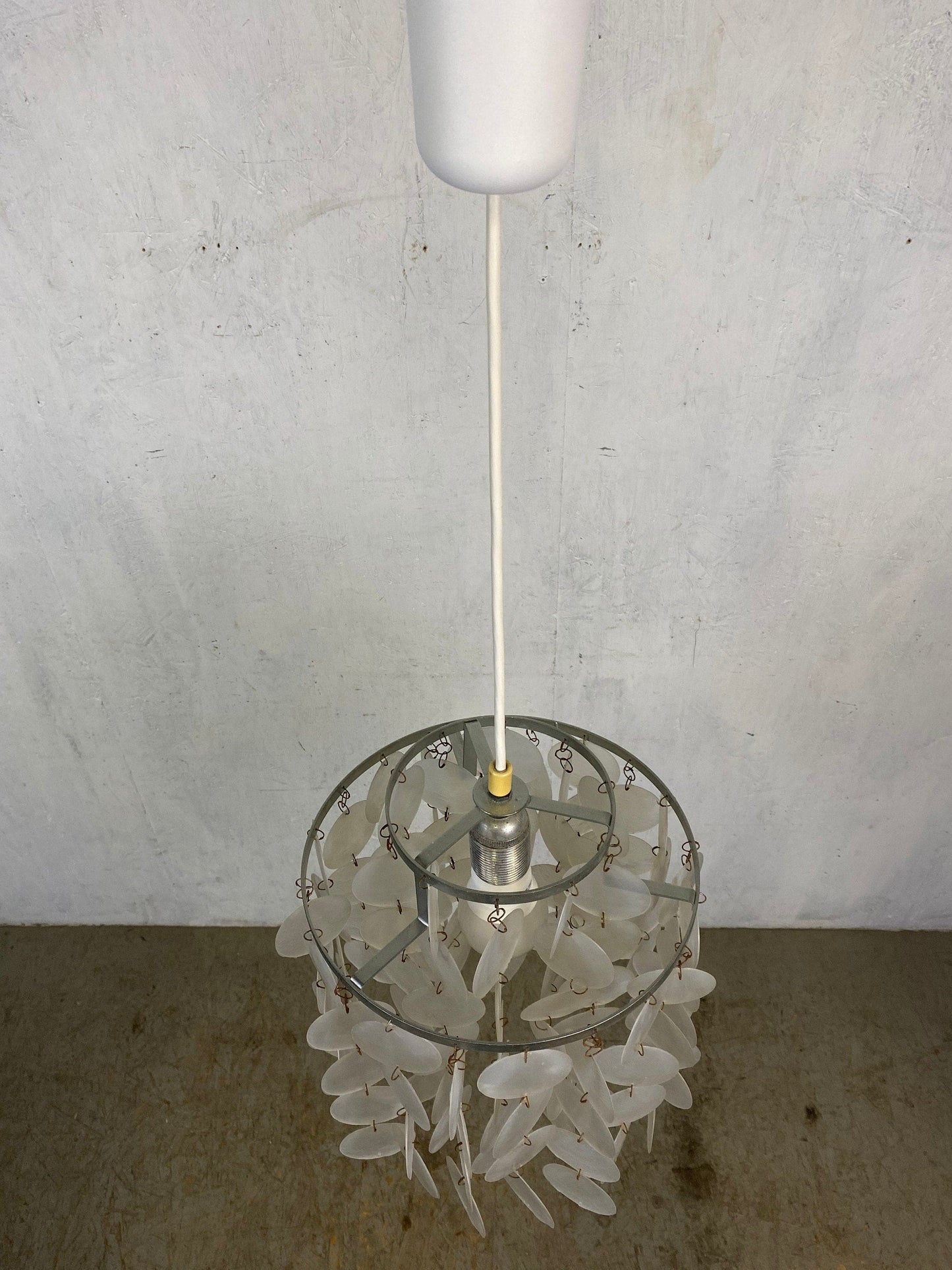 Old fun lamp with plastic plates in mother of pearl look vintage