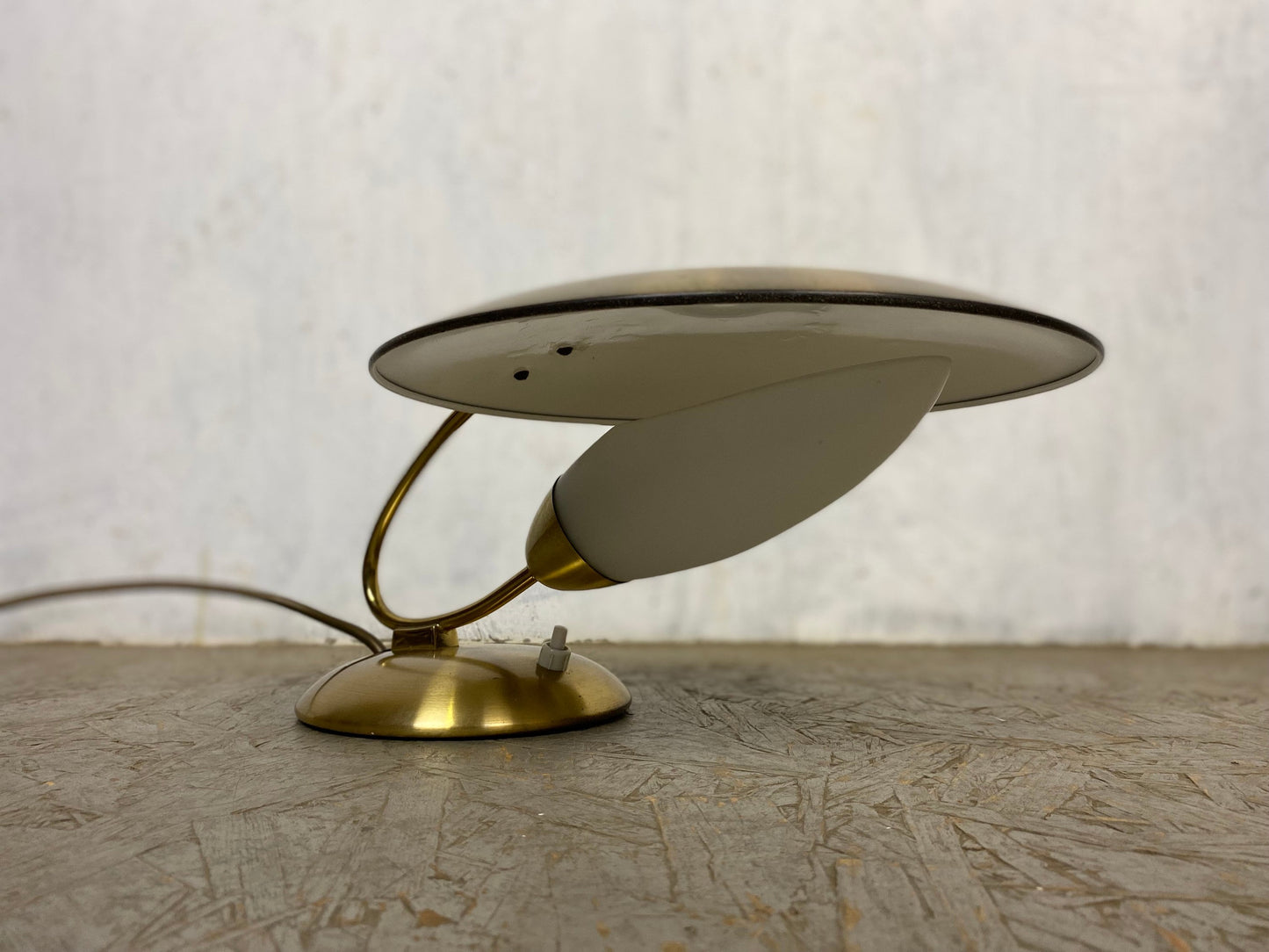 Extravagant designer lamp in vintage brass