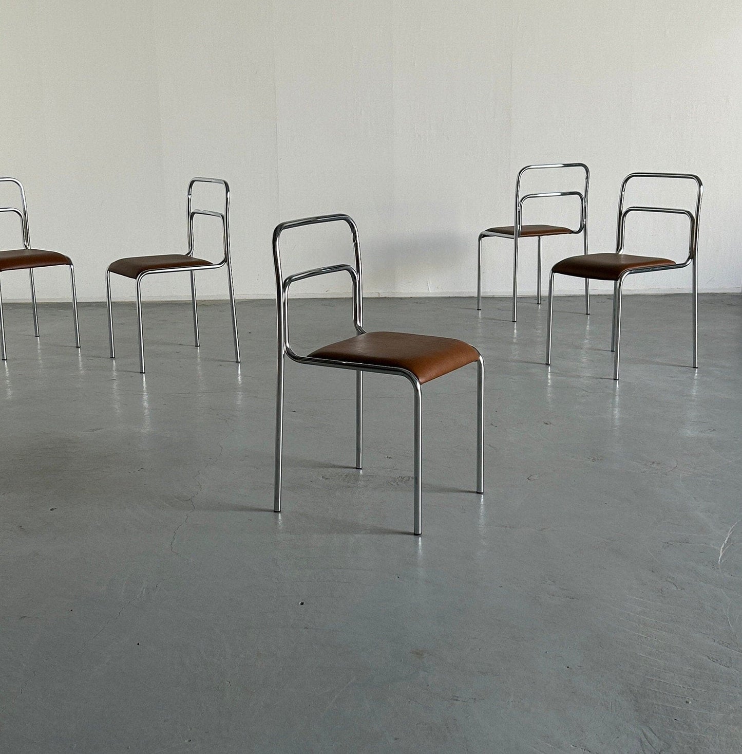 Bauhaus design chrome tubular steel and brown faux leather dining chairs, 1980s Italian modernist stackable dining chairs vintage