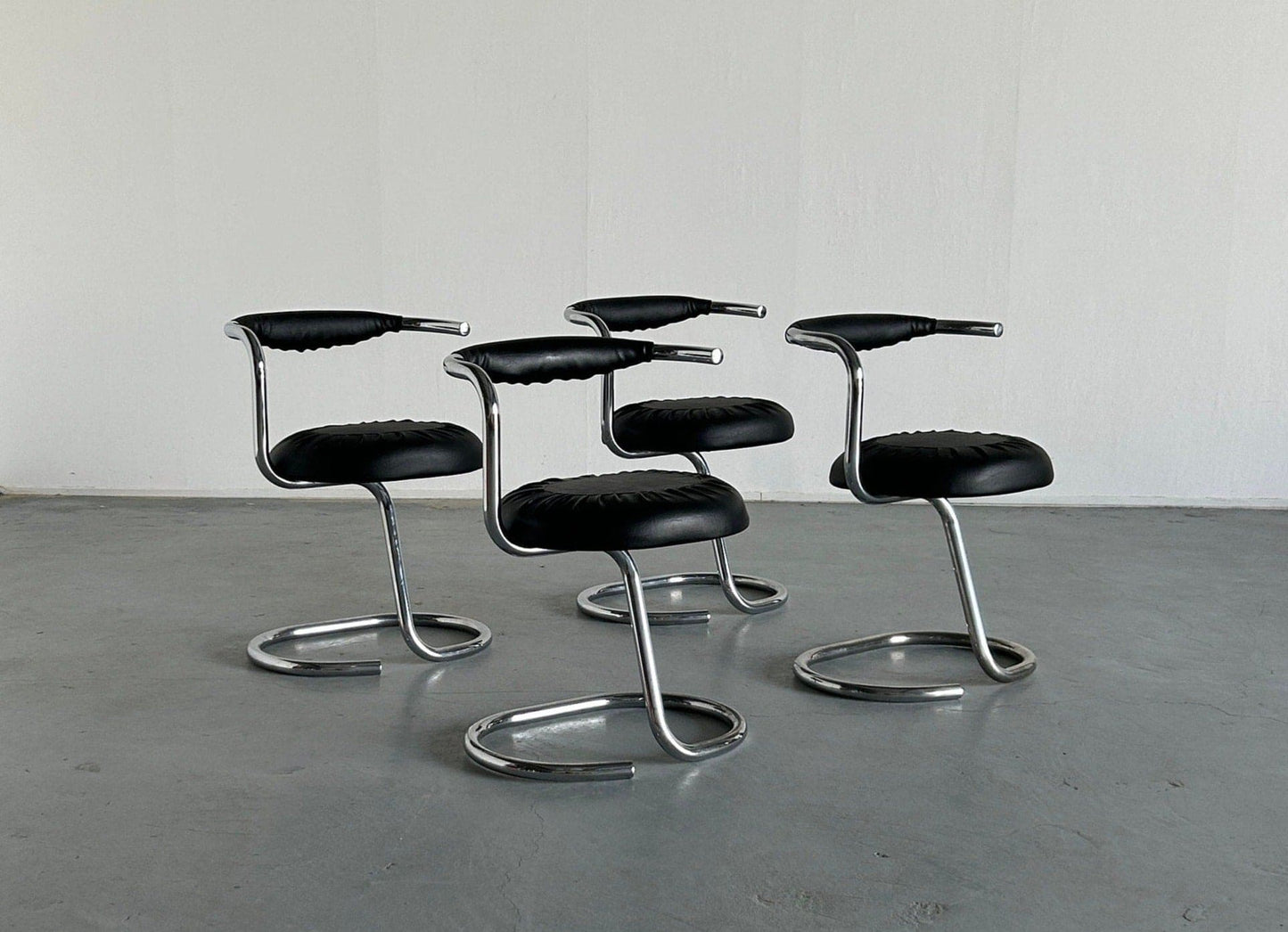 Set of 4 Vintage 'Cobra' Chairs by Giotto Stoppino in Black Faux Leather, 1970s Italy