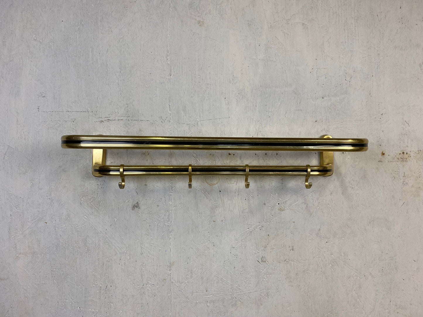 Stylish Fifties coat rack in brass with black decorative stripe Vintage