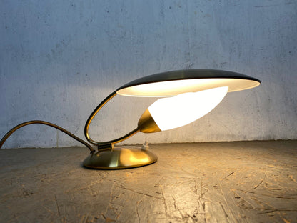 Extravagant designer lamp in vintage brass