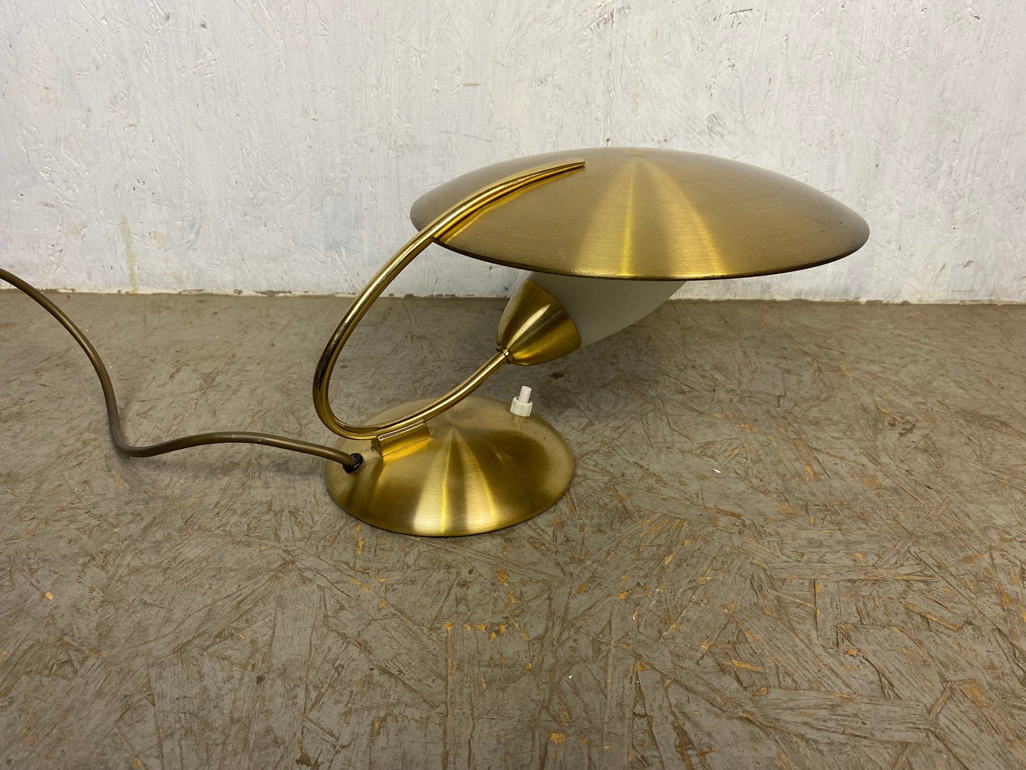 Extravagant designer lamp in vintage brass