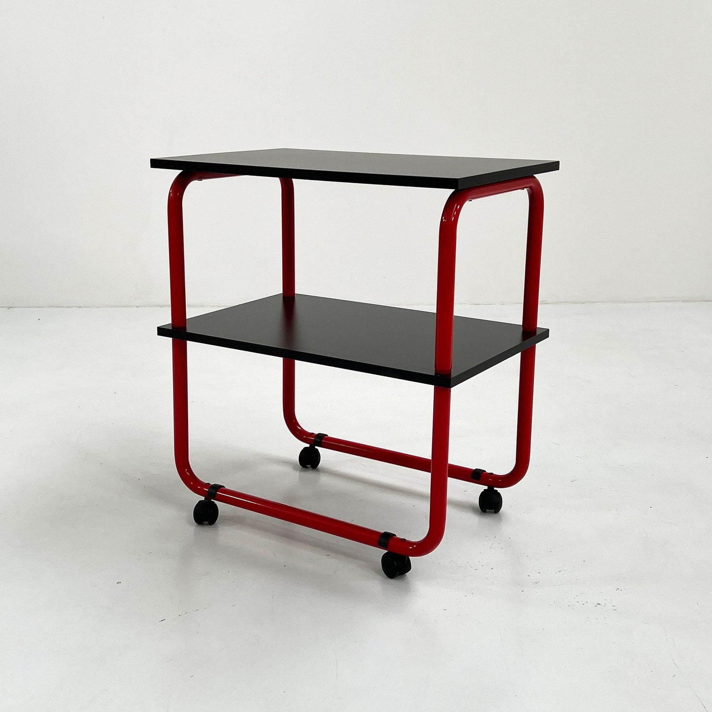 Tubular console table / wall table on wheels in metal and wood, 1980s vintage