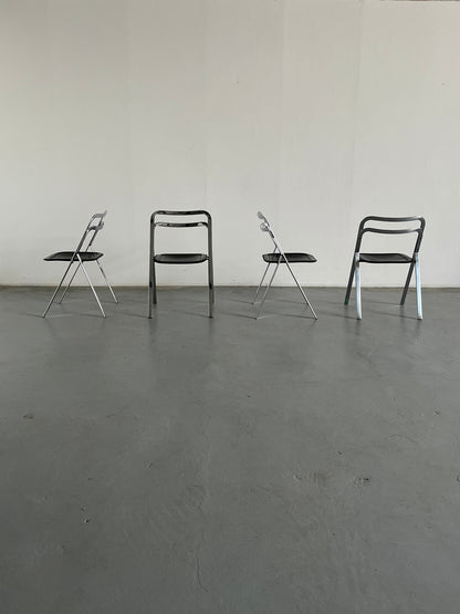 Set of 4 mid-century “Clio” folding chairs by Giorgio Cattelan for Cidue in leather and chrome, Italy 1970s vintage