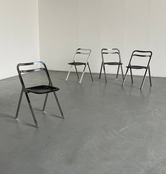 Set of 4 mid-century “Clio” folding chairs by Giorgio Cattelan for Cidue in leather and chrome, Italy 1970s vintage