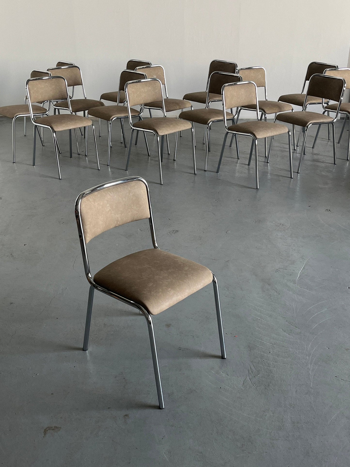 Bauhaus design chrome tubular steel and beige faux leather Italian modernist dining chairs, 1980s vintage