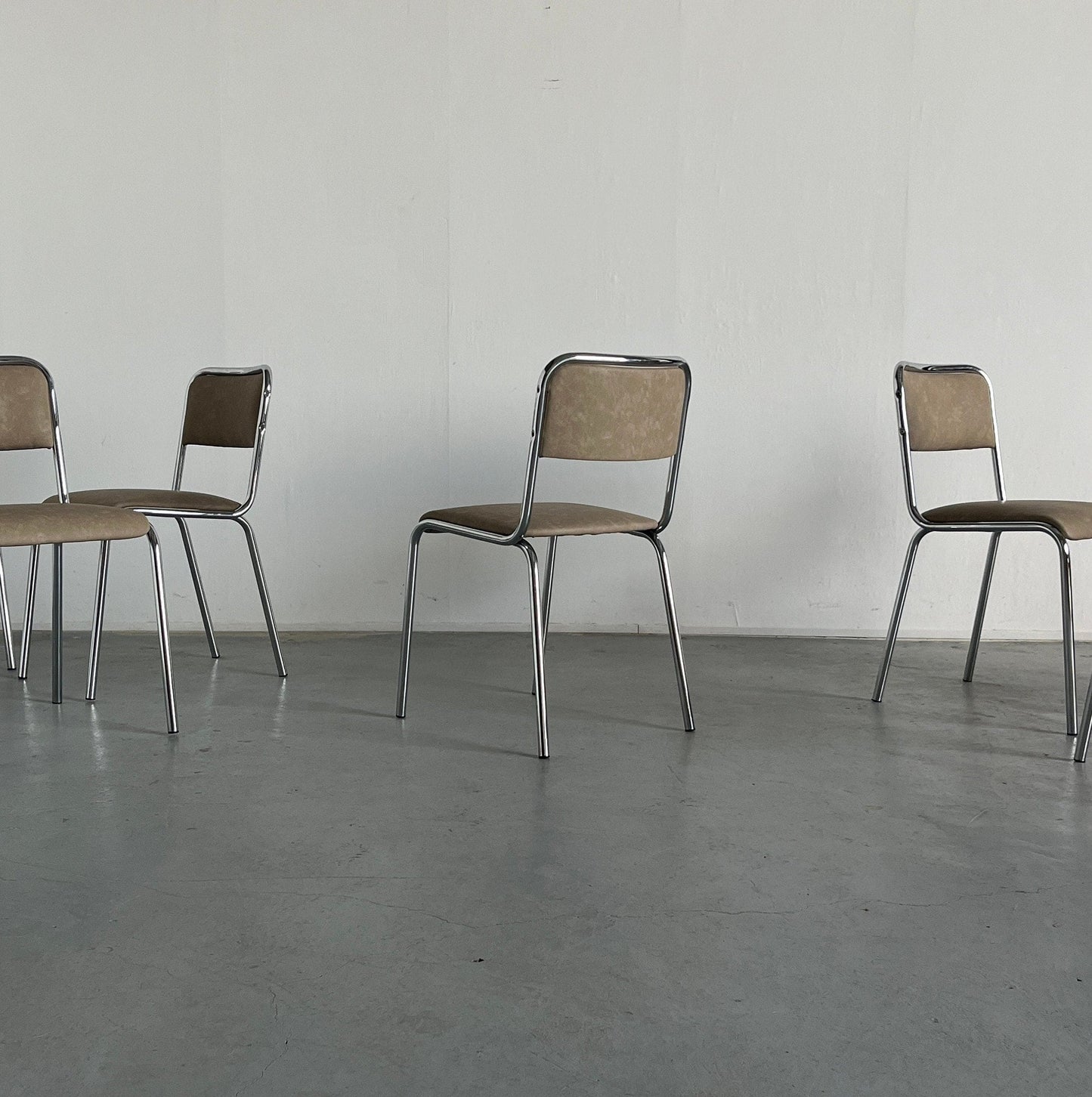 Bauhaus design chrome tubular steel and beige faux leather Italian modernist dining chairs, 1980s vintage