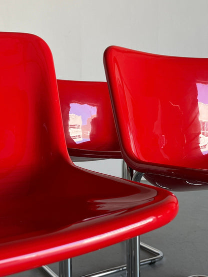 Ensemble de 4 chaises de salle à manger Space Age, plastique rouge brillant et acier tubulaire chromé, Italie Vintage années 1960