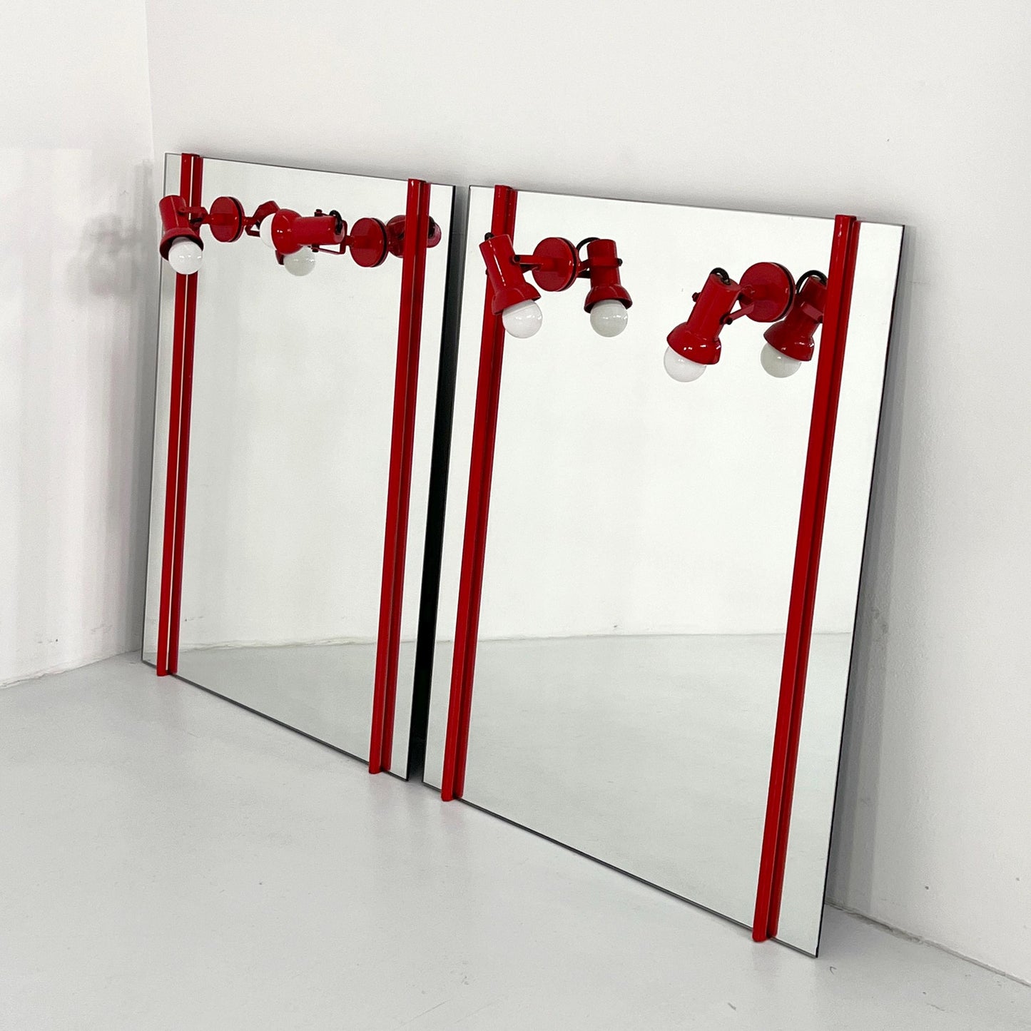 Red metal mirror with adjustable lamps, 1970s vintage